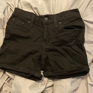 black jean shorts, mid length, Levi’s